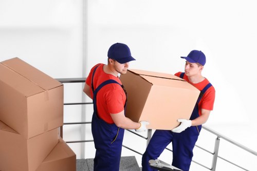 Removal team preparing for a flat move in Barnes
