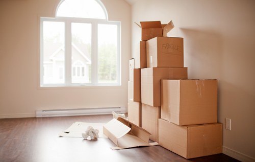Moving van and packed boxes in Barnes street