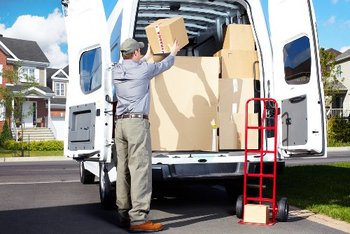 Careful loading of furniture into a moving truck in Barnes