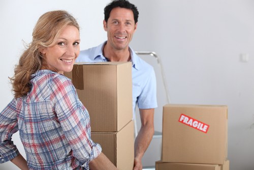 Local movers packing fragile household items in Barnes