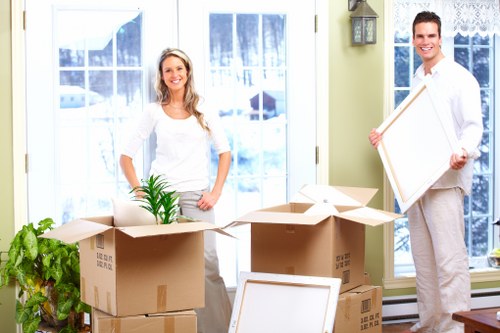 Packing boxes and furniture for house removals in Barnes