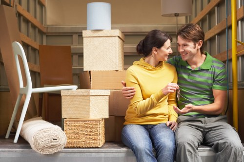 Professional movers loading furniture for a Barnes home move